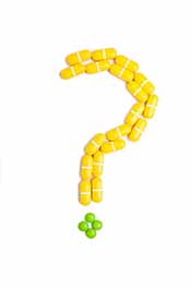 Píldoras bloqueadoras de carbohidratos en forma de signo de interrogación.