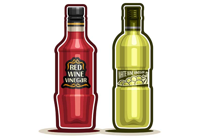 Imagen de una botella de vinagre de vino tinto y una botella de vinagre de vino blanco