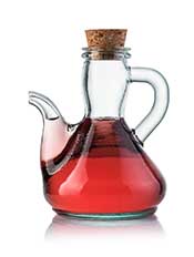 Botella de Vinagre de Vino Tinto Fermentado.