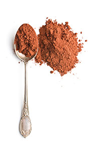 Cacao En Polvo En Una Cuchara De Metal.