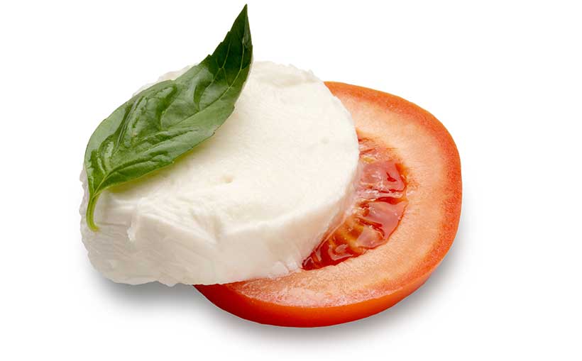 Ranuras de mozzarella en ranuras de tomate Top Tomate.